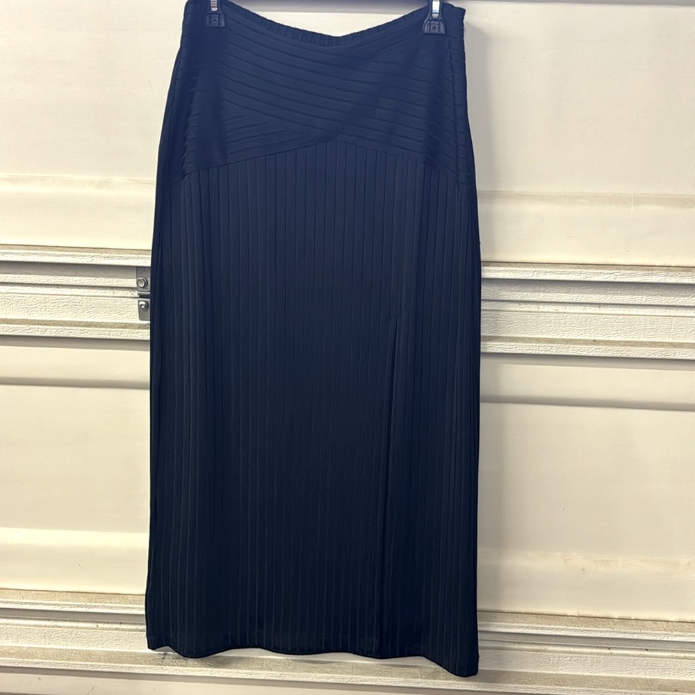 Anthropologie front slit skirt. Flattering fit accentuates all the right curves.